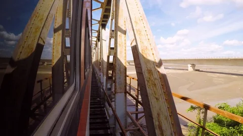 Travel in old train in a bridge over river Bolivia Santa Cruz Video stock 90357199
