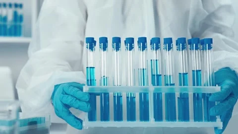 Travel through stages of experimentation in the lab, where a scientist tests new Stock Footage 263156243