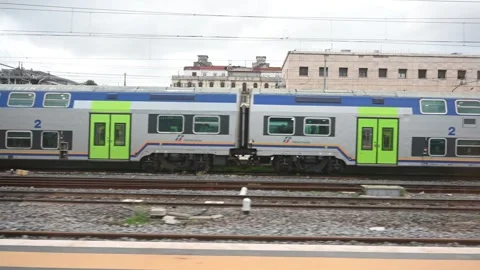 Travel by train. A modern express train enters the railway station. Stock Footage 296357736