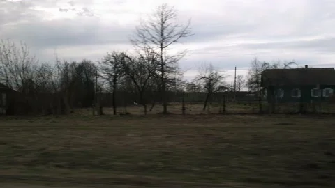 Travel view from the car window of village houses, street in the private sector Stock Footage 237240341