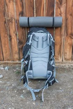 Traveler backpack on ground Stock Photos