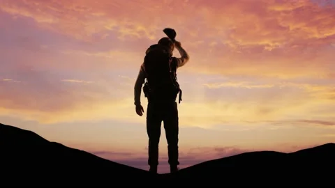 Traveler with backpack over sunset background. Alpine peaks landscape background Stock Footage 220502252