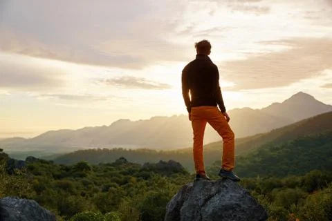 Traveler on the cliff Stock Photos