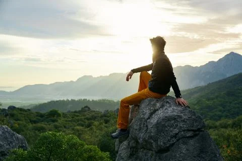 Traveler on the cliff Stock Photos