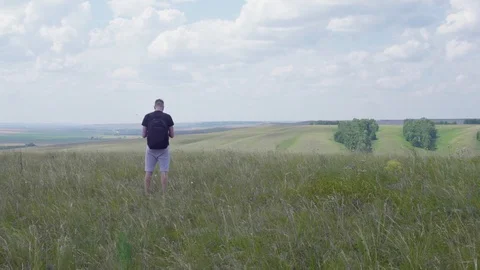 The traveler is on the field Video stock 101981535