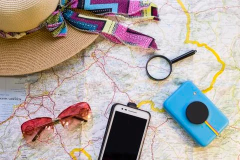 Traveler items on a map Foto stock