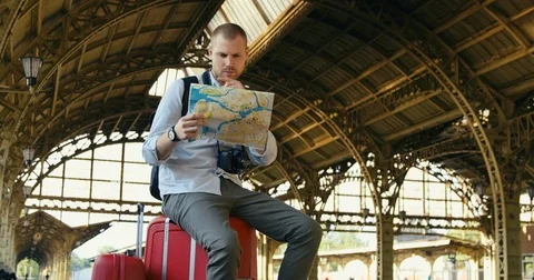 Traveler Man With Map Stock Footage 78794318