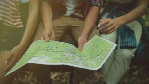 Traveler map in the hands of backpackers Stock Footage 96196838
