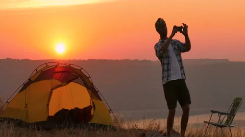 Traveler in really good mood making selfie on sunrise.  Stock Footage 68024208