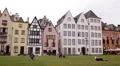 Traveler Relaxing People Grass Sitting Cologne Iconic Historic Old Town Sidewalk HD Footage