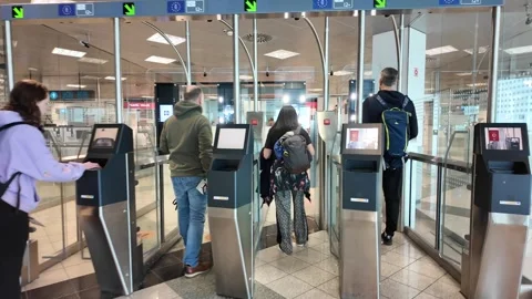 Travelers Using Automated Passport Control E?Gates at an Airport Security C.. Stock Footage 340166061