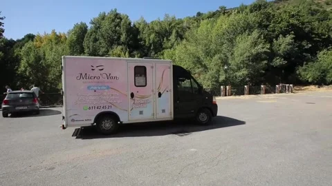 A traveling aesthetic in the town square, a commitment to beautifying the rural  Stock Footage 317493450