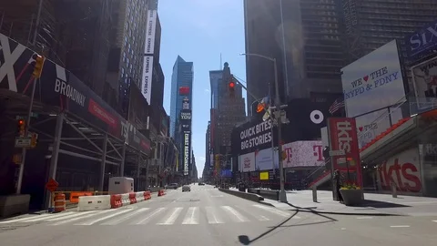 Traveling down empty 7th Ave. in Times Square during Corona lockdown Stock Footage 127876619