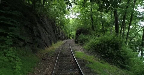 Traveling down freight train tracks, point of view, rural industrial area, Stock Footage 133731853