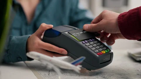 Traveling, Efficient Administrator Joyfully Giving Payment Terminal for Onli Stock Footage 242537763