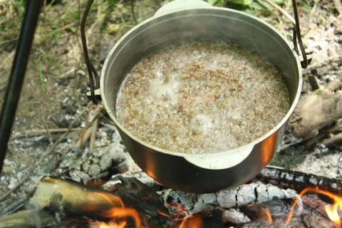 Traveling, porridge in a pot Stock Photos