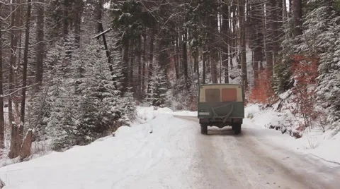 Traveling in an off-road vehicle on dangerous roads in the mountains Stock Footage 59159084