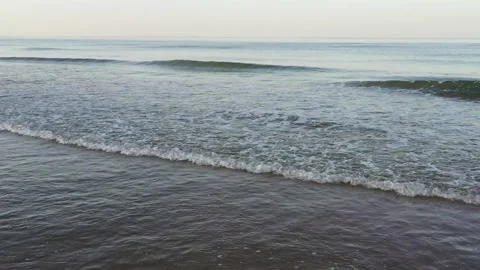 Traveling on the sea waves on a beach Stock Footage 200213014