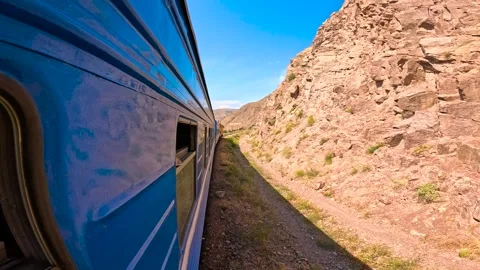 Traveling through the mountains by train Vídeo Stock 282369150