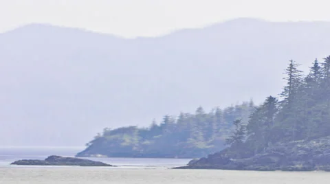 Traveling time lapse view of the Inside Passage with a foggy mist Stock Footage 52215384