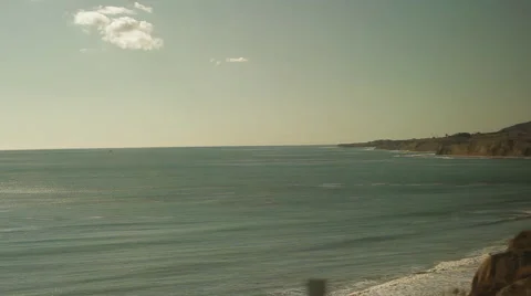 Traveling on train, looking out window viewing beach &amp; waves-16 Stock Footage 43735963