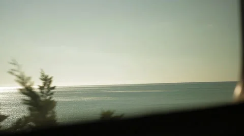 Traveling on a train, out window viewing trees, ocean-04 Stock Footage 43737083