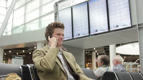Traveller making last calls before flight Stock Footage 40833495