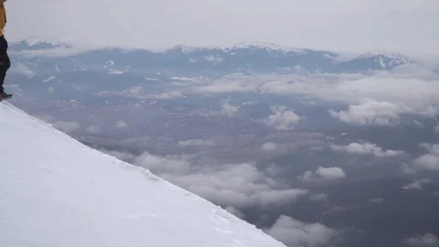 Traveller in the mountains in winter Stock Footage 128170542