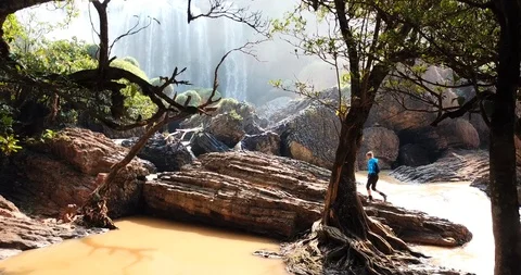 Traveller walking at Elephant Waterfall Stock Footage 88311534