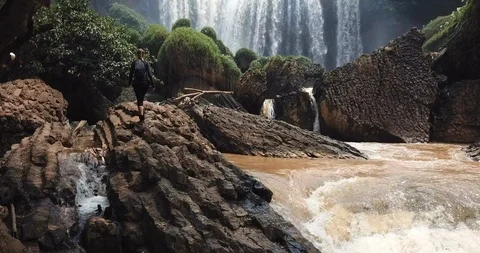 Traveller walking at Elephant Waterfall Stock Footage 88341899