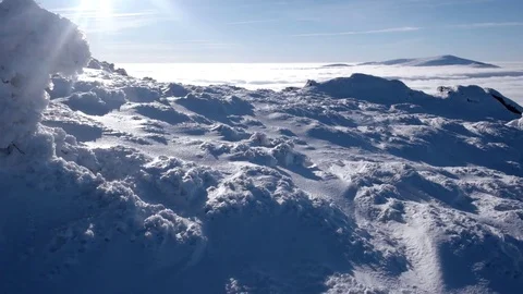 Travellers With Backpacks Make a Winter Hike Above the Clouds With a View of 動画素材 71200669