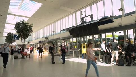 Travellers Inside Modern Bus Termina in Glasgow, Scotland, UK Stock Footage 119140703