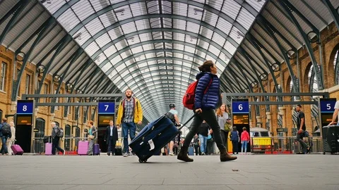 Travellers at Kings Cross Train Station in London, England UK 4K Stock Footage