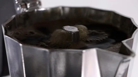Travelling close up of final coffee coming out of Italian coffee Stock Footage 263058512