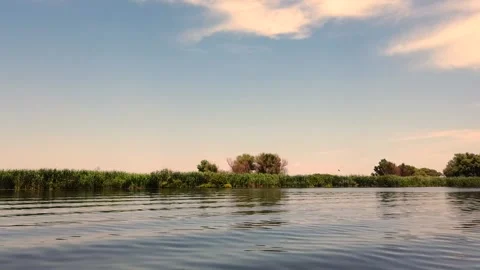 Travelling on Danube at sunset Stock Footage 202203511
