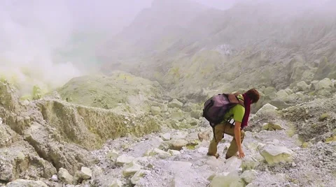 Travelling down to the crater of Ijen volcano,Java Stock Footage 61347229