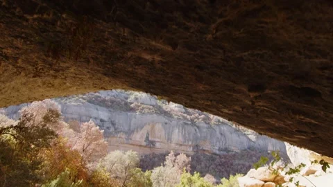 Travelling from inside the cave in the climbable mountains of Margalef, Spain Stock Footage 289294864