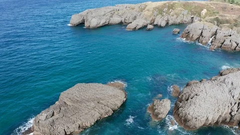 Travelling shot of the cliffs and reefs of the coast in Sonabia #033, Spain Stock Footage 106770927