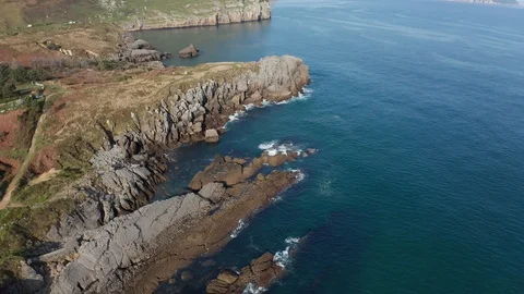 Travelling shot of cliffs and reefs of the coast in Sonabia #087, Spain Stock Footage 106775128