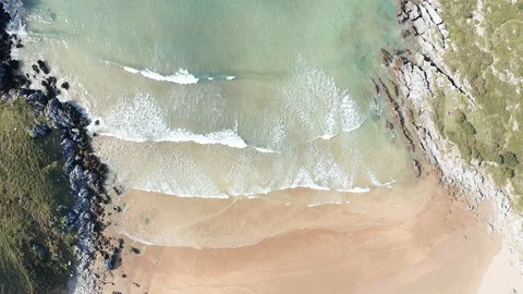Travelling shot of tide waves in a beach in Cantabrian sea at dawn #019 Stock Footage 106770703