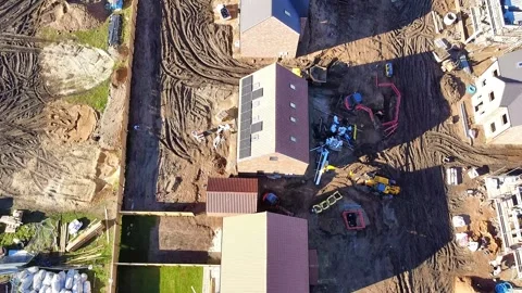 Traversing down the rooftops of new houses being built Video stock 343020558