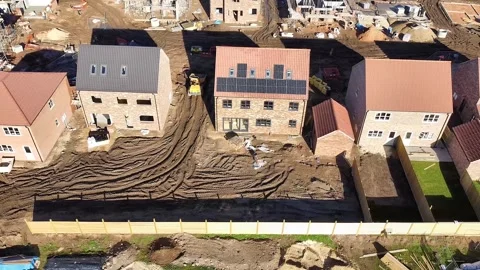 Traversing left to right across new homes being built Stock Footage 339614998