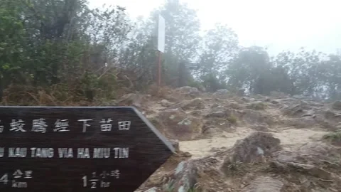 Traversing steep paths: Uncovering courage at the top of a hill Stock Footage 242228662