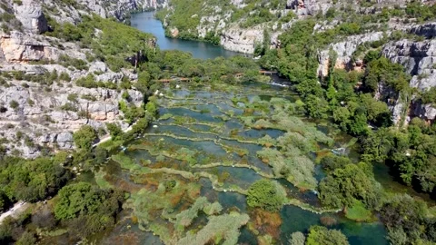 Travertine barriers in the river canyon Stock Footage 220563008