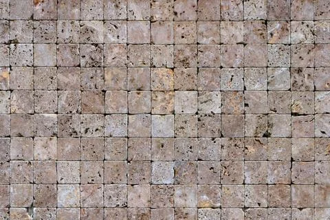 Travertine masonry tiles cladding wall texture. Square stones surface backgro Stock Photos