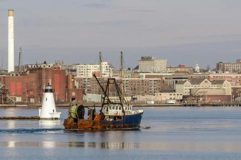 Trawler Buzzards Bay passing lighthouse Stock Photos