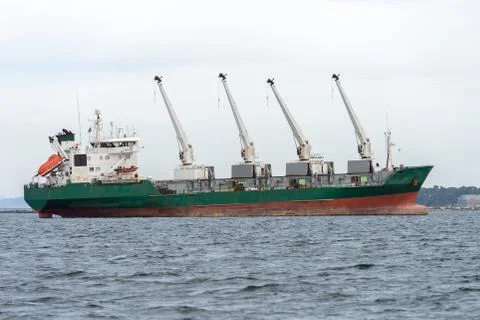 Trawler with cranes on deck at sea Stock Photos