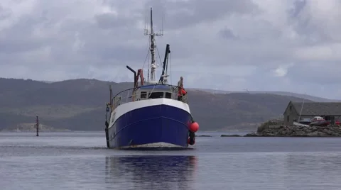 TRAWLER NANCY  GLEN ENTERING TARBERT HARBOUR Stock Footage 68995835