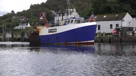 TRAWLER NANCY  GLEN ENTERING TARBERT HARBOUR Stock Footage 68995844