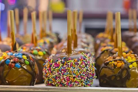 Tray of assorted variety of candy apples at state fair Stock Photos
